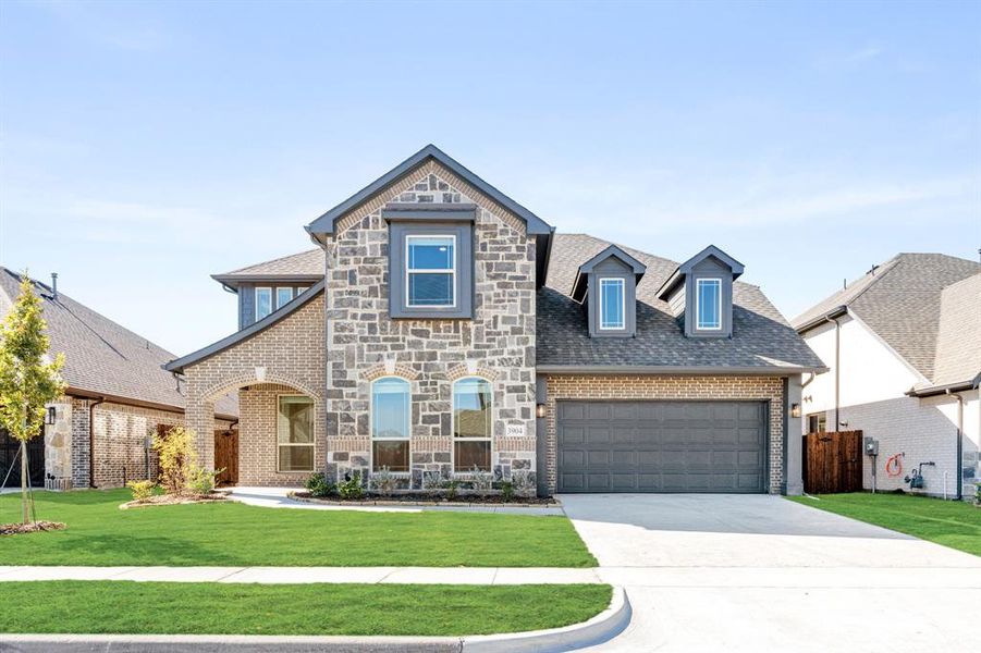 Front exterior of a new home in Ridge Ranch Classic 60, Mesquite, TX, highlighting curb appeal (Image 19).