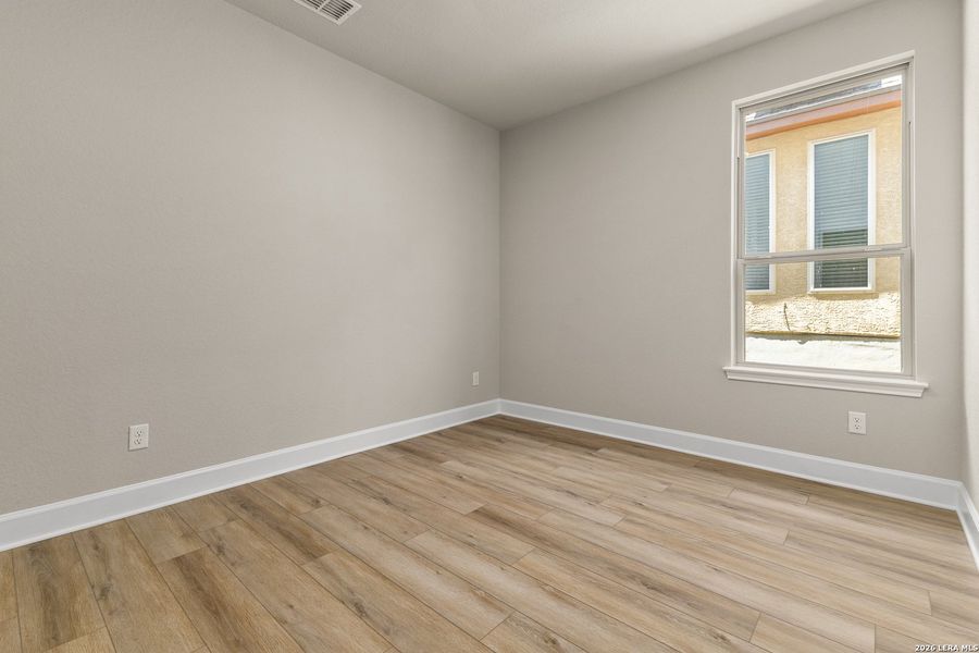 Spacious, unfurnished interior of a new home in The Enclave at Potranco Oaks, Castroville (Image 17).