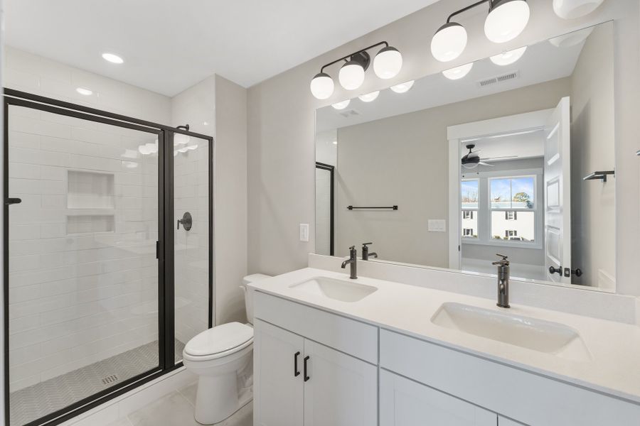 Representative furnished interior of a home built from the Holland by Hunter Quinn Homes in Renaissance Place, Greenville (Image 16).