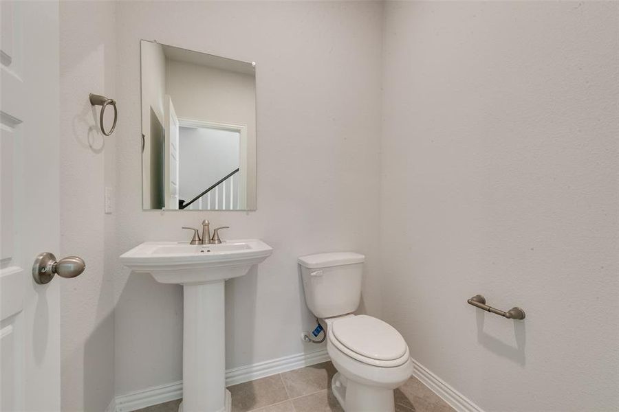 Furnished interior view inside a new home in Villages of Hurricane Creek, Anna (Image 8).