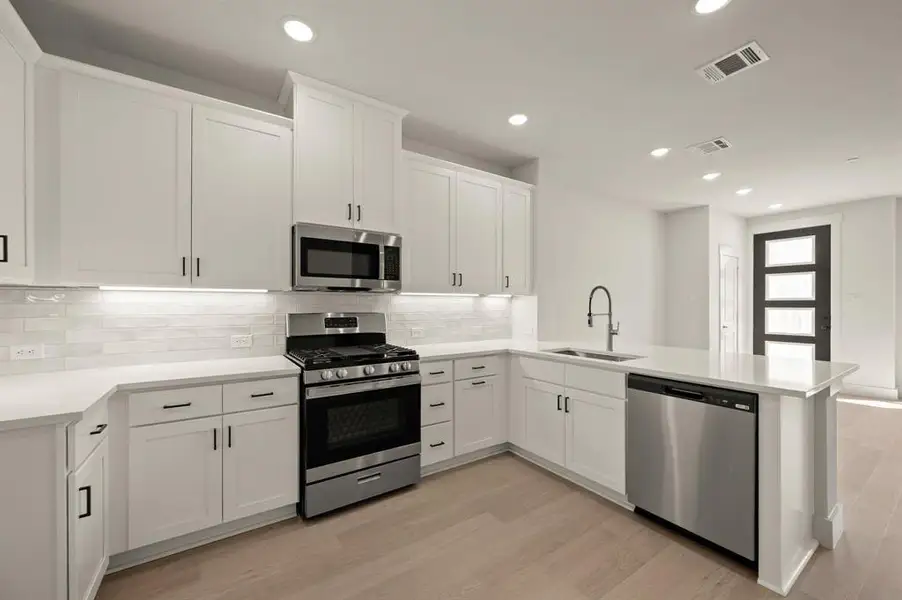 Beautiful finishes and thoughtful design elements make this kitchen stand out from the crowd!