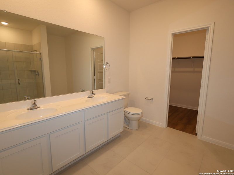 Furnished interior view inside a new home in Greenspoint Heights, Seguin (Image 5).