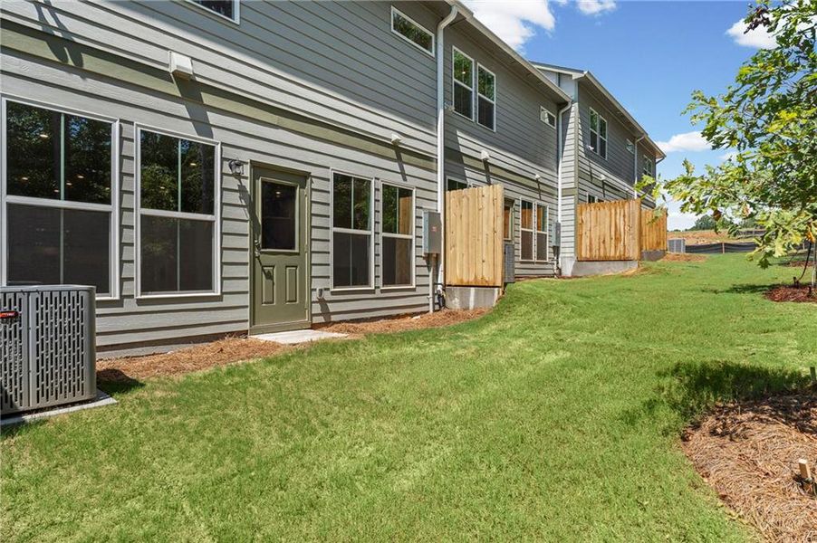 Exterior details and patio area of a home in Ansley Towns, Cumming (Image 4). Exterior details and patio area of a home in Ansley Towns, Cumming (Image 4).