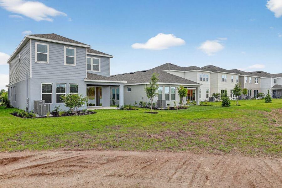 Exterior details and patio area of a home in Firethorn, Parrish (Image 24).