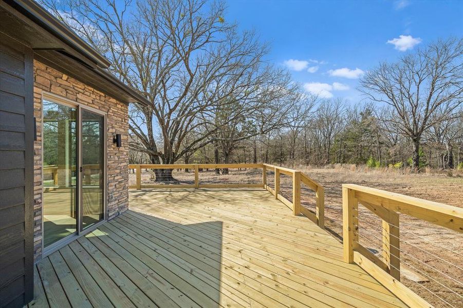 HUGE back deck overlooking east Texas land!
