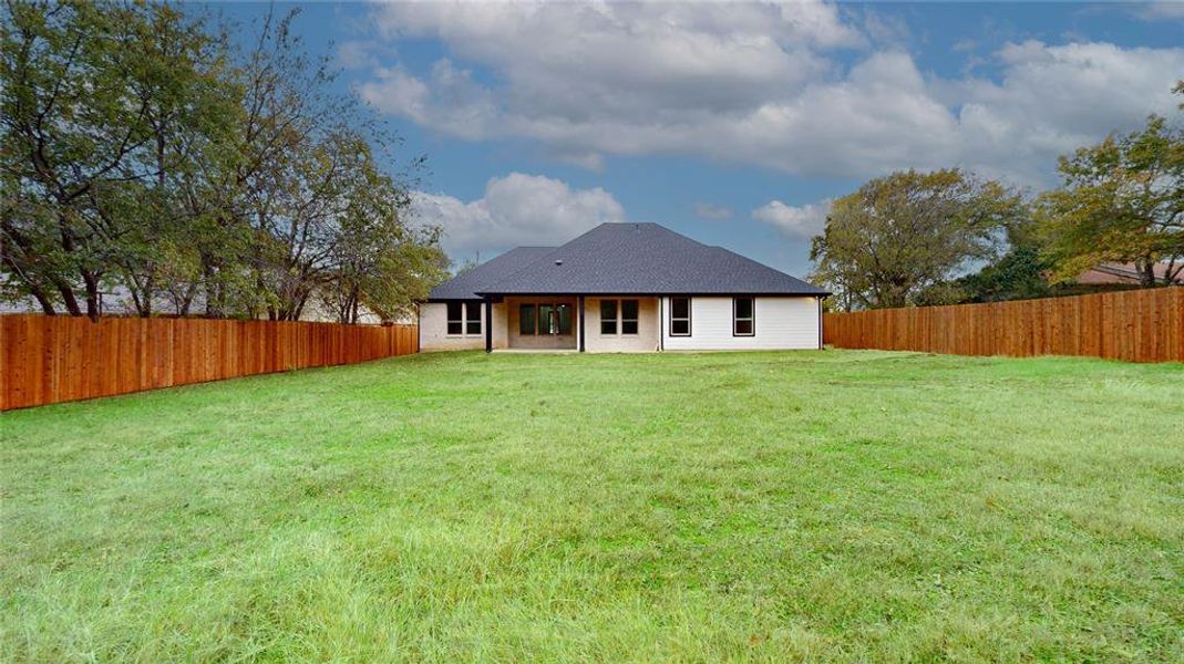 Exterior details and patio area of a home in , Denton (Image 3).