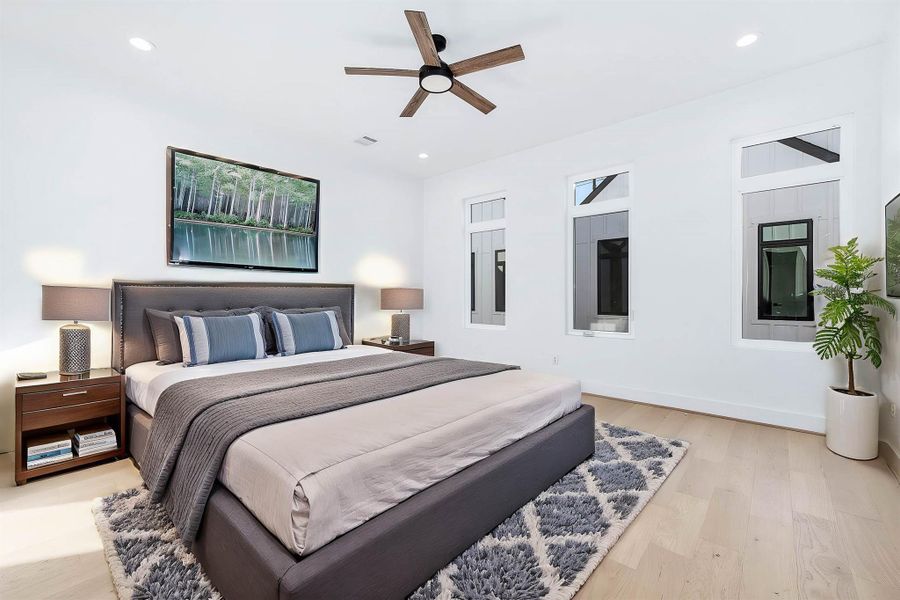 Large master bedroom with lots of natural lighting. This is virtually staged