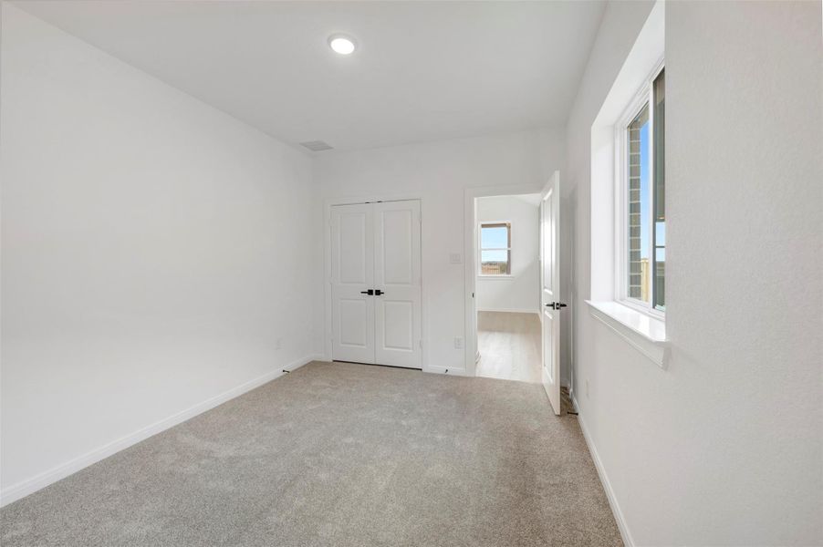 Spacious, unfurnished interior of a new home in The Grand Prairie 50’, Hockley (Image 33).