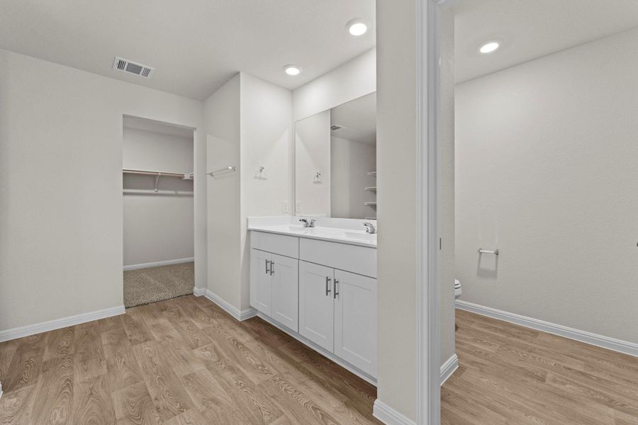 Furnished interior view inside a new home in Whisper South, San Marcos (Image 9).