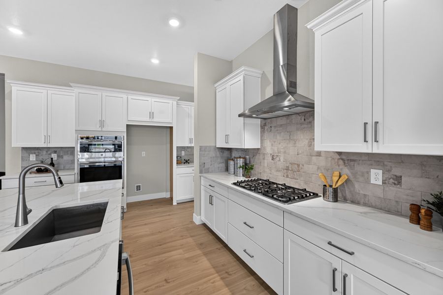Furnished interior view inside a new home in Trailstone, Arvada (Image 4).