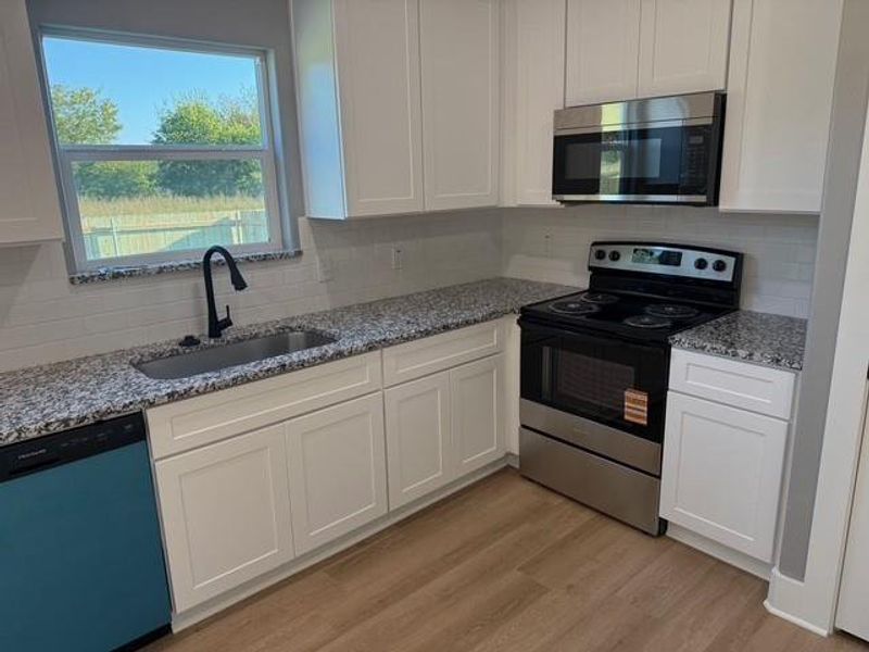Furnished interior view inside a new home in , Bells (Image 3).