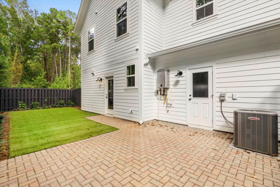 Exterior details and patio area of a home in , Johns Island (Image 21).