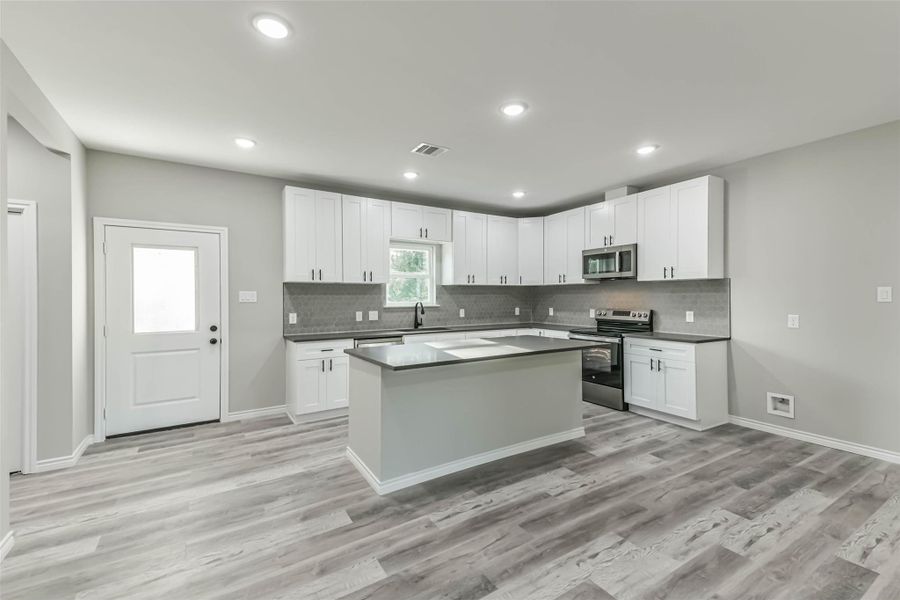 Furnished interior view inside a new home in , Splendora (Image 8). Furnished interior view inside a new home in , Splendora (Image 8).