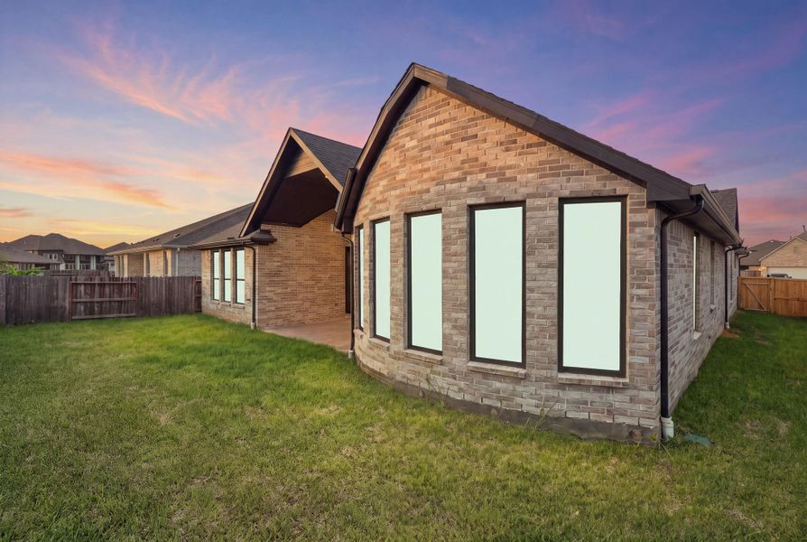Exterior details and patio area of a home in Coastal Point, League City (Image 3).