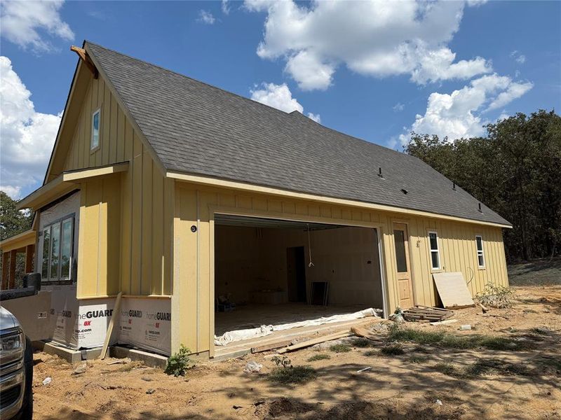 Exterior details and patio area of a home in , Poolville (Image 3).