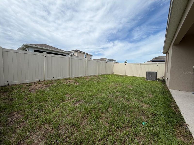 Exterior details and patio area of a home in Marion Creek, Haines City (Image 3).