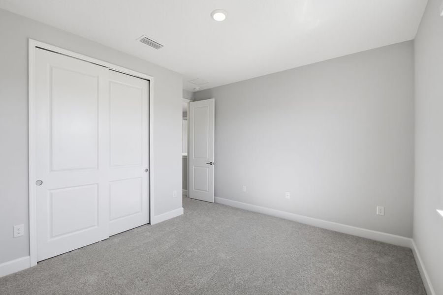 Representative unfurnished interior of a home built from the Cumberland by Taylor Morrison in Harvest at Ovation, Winter Garden (Image 54).