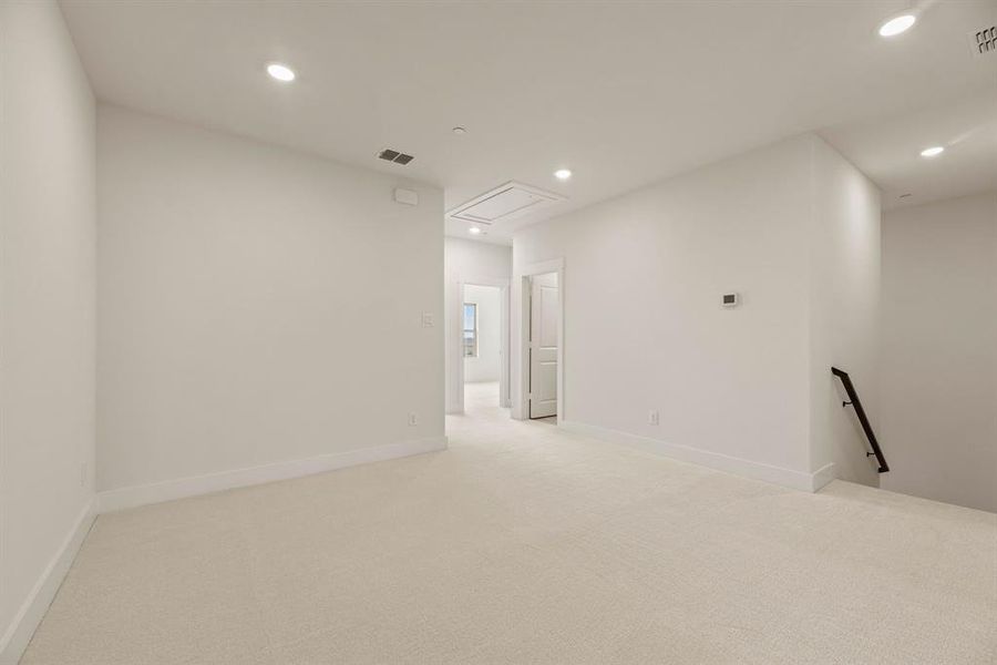 The upstairs game room is a perfect casual family living area. The upstairs game room is a perfect casual family living area.