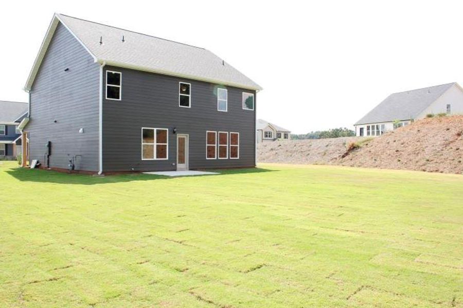 Front exterior of a new home in , Commerce, GA, highlighting curb appeal (Image 18).