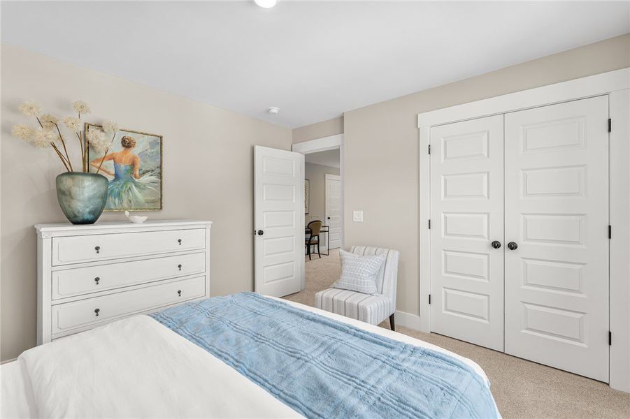 This serene bedroom offers a calm retreat with amp