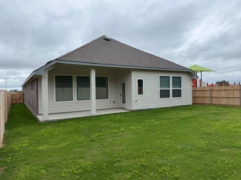 Exterior details and patio area of a home in Grande Estates, Bertram (Image 3).