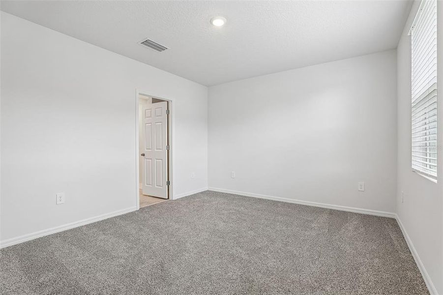 Spacious, unfurnished interior of a new home in Bradbury Creek - Classic Series, Haines City (Image 32). Spacious, unfurnished interior of a new home in Bradbury Creek - Classic Series, Haines City (Image 32).