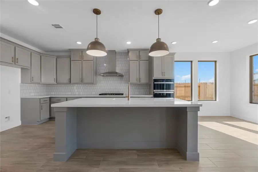 Furnished interior view inside a new home in Grange - 55', Katy (Image 4).