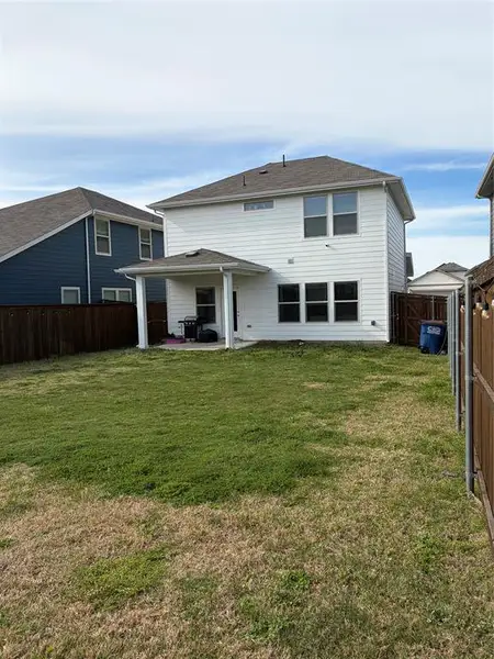 Exterior details and patio area of a home in Lakehaven - Spring Series, Farmersville (Image 4).