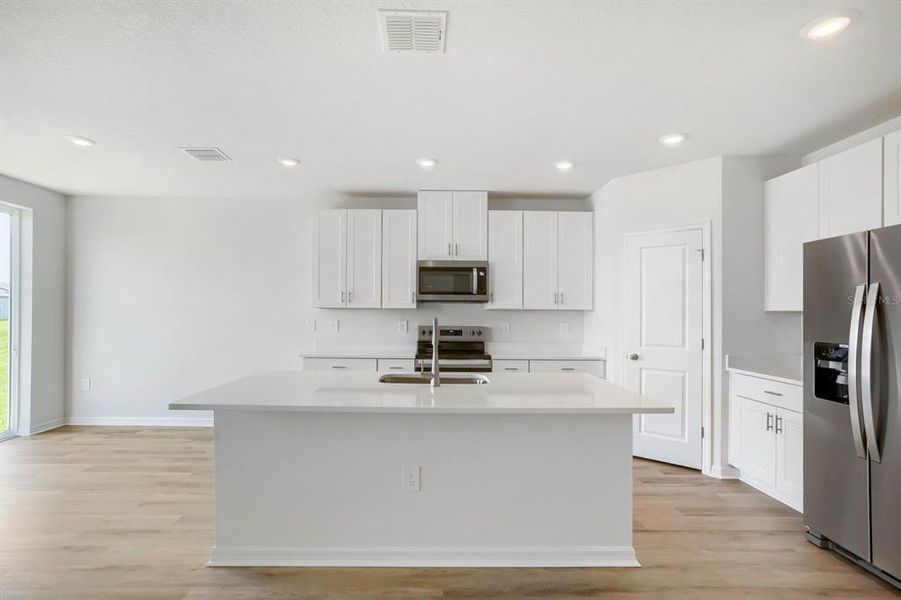 Furnished interior view inside a new home in Salt Meadows - Classic Series, Parrish (Image 13).