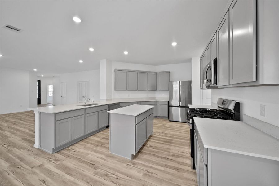 Furnished interior view inside a new home in The Highlands: Richmond Collections, Porter (Image 10).