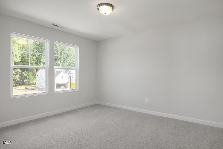 Spacious, unfurnished interior of a new home in Woodland Crossing, Zebulon (Image 26).