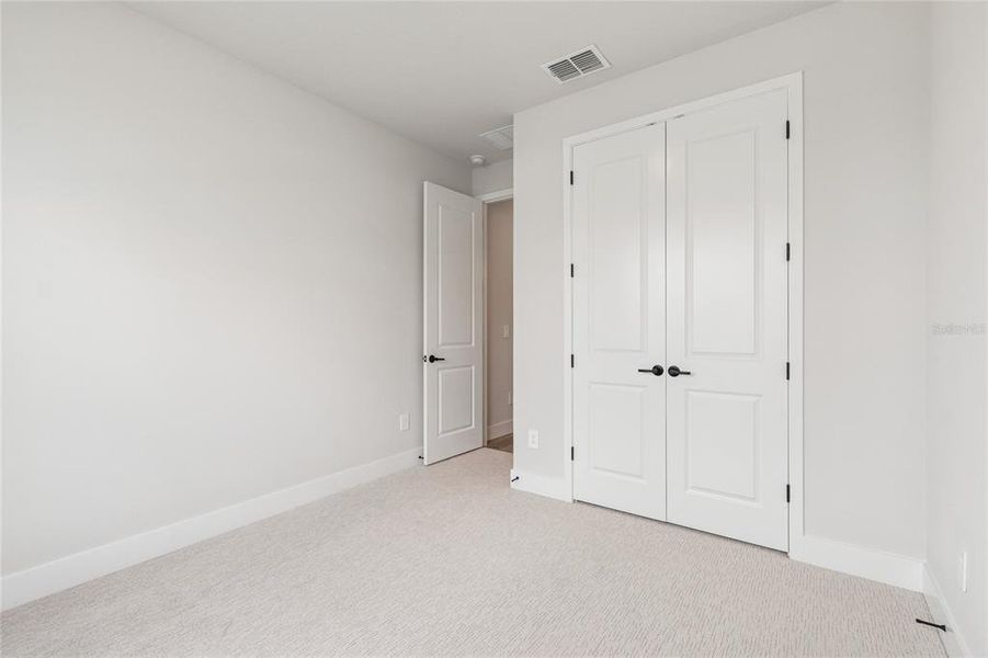 Spacious, unfurnished interior of a new home in Gracewater at Sarasota, Sarasota (Image 30).