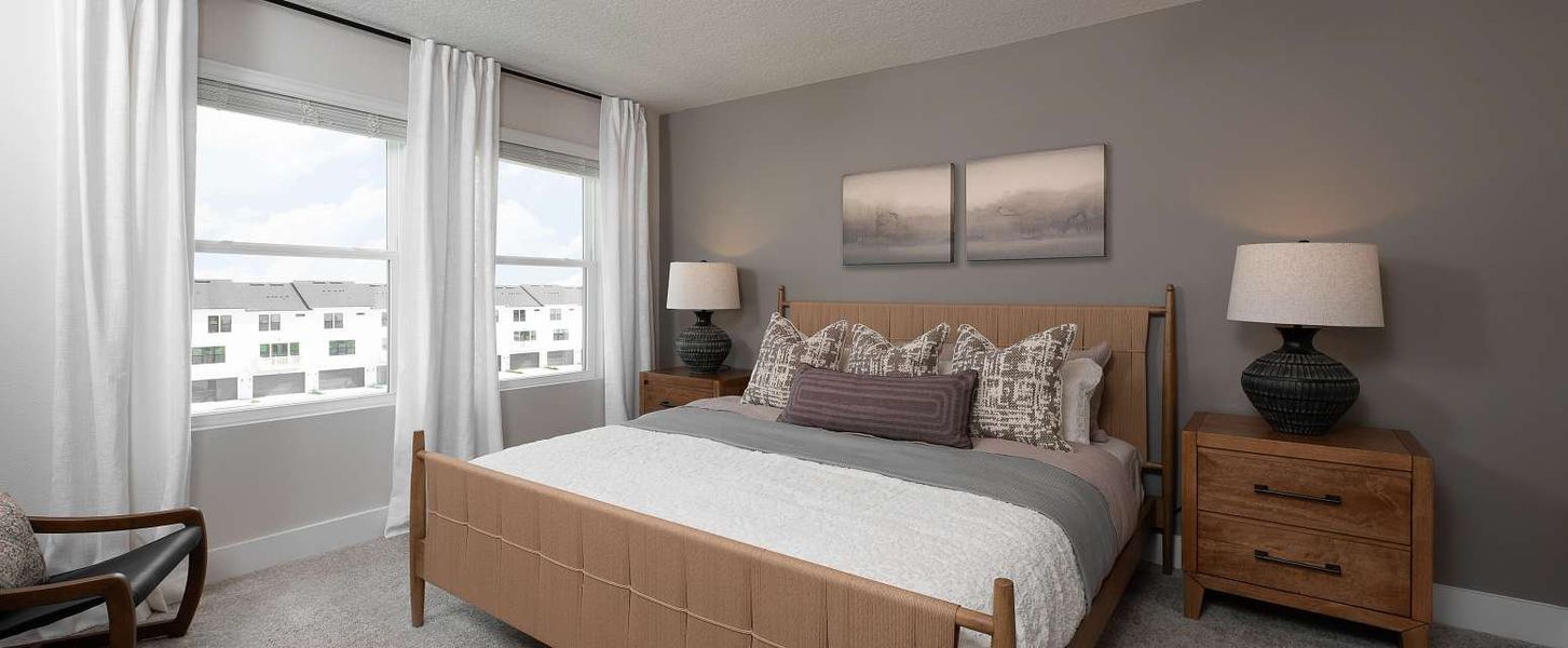 Representative furnished interior of a home built from the Haines II End Unit by Ashton Woods in Parkview at Hamlin, Winter Garden (Image 10).