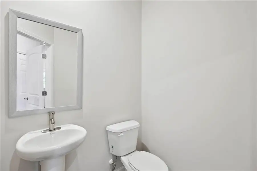 Furnished interior view inside a new home in The Enclave Townhomes, Hampton (Image 9).