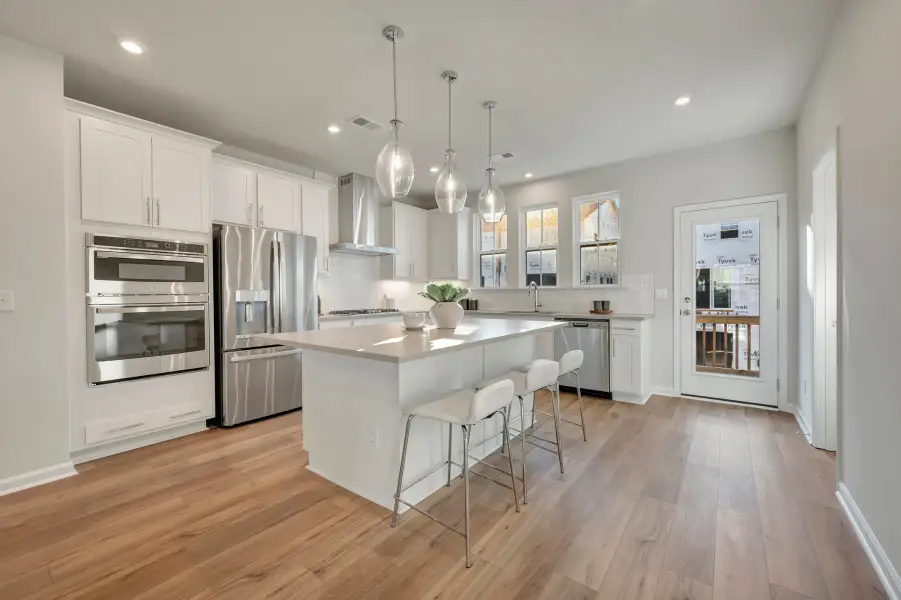 Representative furnished interior of a home built from the Nola by Tri Pointe Homes in Twinleaf Townes, Chapel Hill (Image 4).