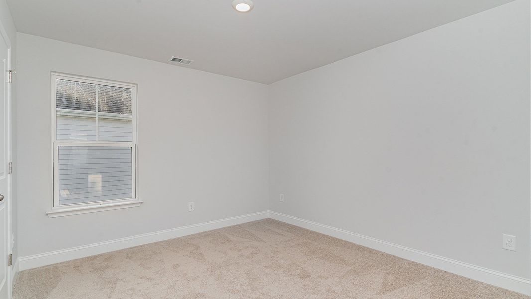 Spacious, unfurnished interior of a new home in The Preserve at Shaftesbury Glen, Conway (Image 15).