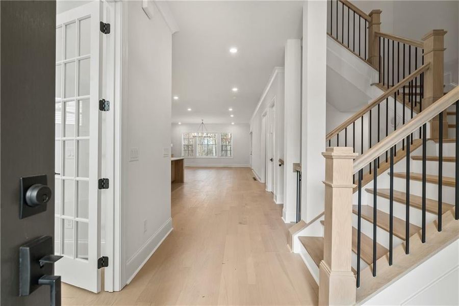 You are greeted with a Beautiful stairway! Not actual home.