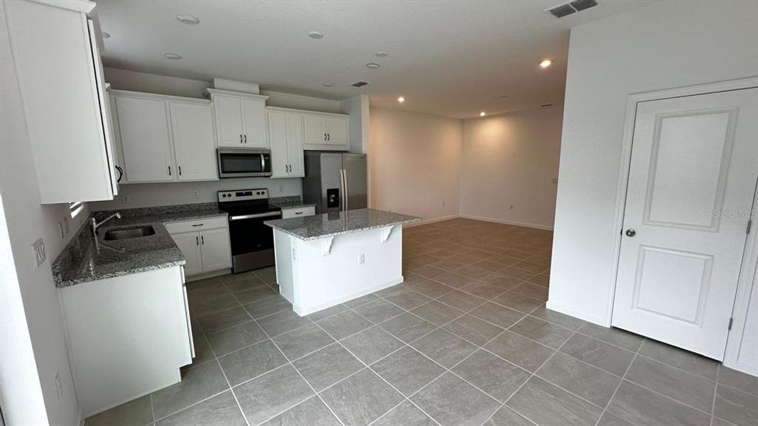 Furnished interior view inside a new home in , Kissimmee (Image 3). Furnished interior view inside a new home in , Kissimmee (Image 3).