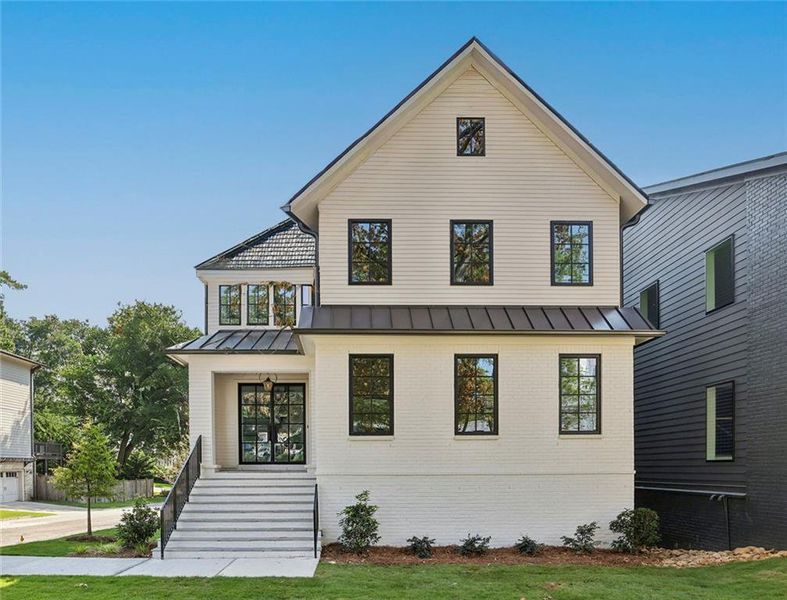 Front exterior of a new home in , Brookhaven, GA, highlighting curb appeal (Image 1). Front exterior of a new home in , Brookhaven, GA, highlighting curb appeal (Image 1).