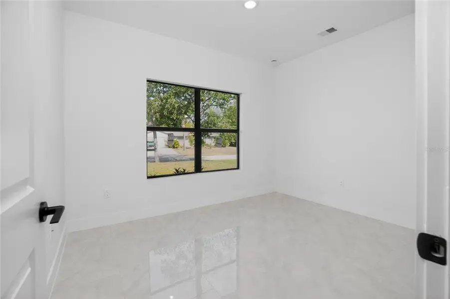 Spacious, unfurnished interior of a new home in , Port Charlotte (Image 52).