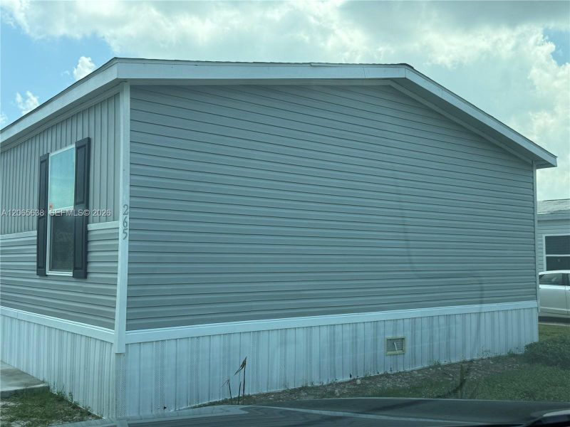 Exterior details and patio area of a home in , Clewiston (Image 2). Exterior details and patio area of a home in , Clewiston (Image 2).