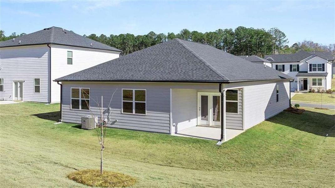 Exterior details and patio area of a home in Oakchase at Hampton, Hampton (Image 3).