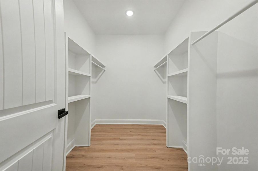 Walk-in closet, tons of built-in shelves. Plenty of storage! Walk-in closet, tons of built-in shelves. Plenty of storage!