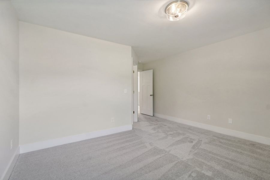 Representative unfurnished interior of a home built from the Sonoma II by Great Southern Homes in Edwards Ridge, Central (Image 39).