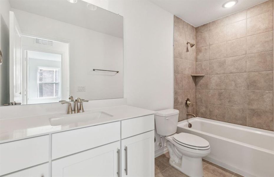 Spacious secondary bathroom*real home pictured