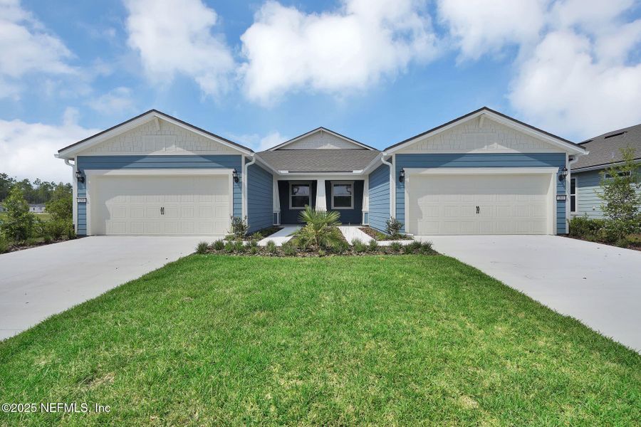 Front exterior of a new home in , Yulee, FL, highlighting curb appeal (Image 18).