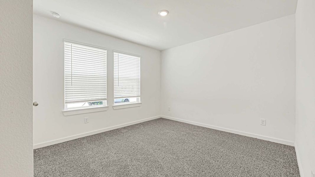 Representative unfurnished interior of a home built from the Cali by D.R. Horton in Holly Ridge, Rosenberg (Image 28).