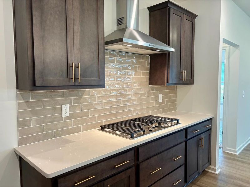 Kitchen featuring AW Collection® Oxford - Matte finishes, light wood, and refined style. Kitchen featuring AW Collection® Oxford - Matte finishes, light wood, and refined style.