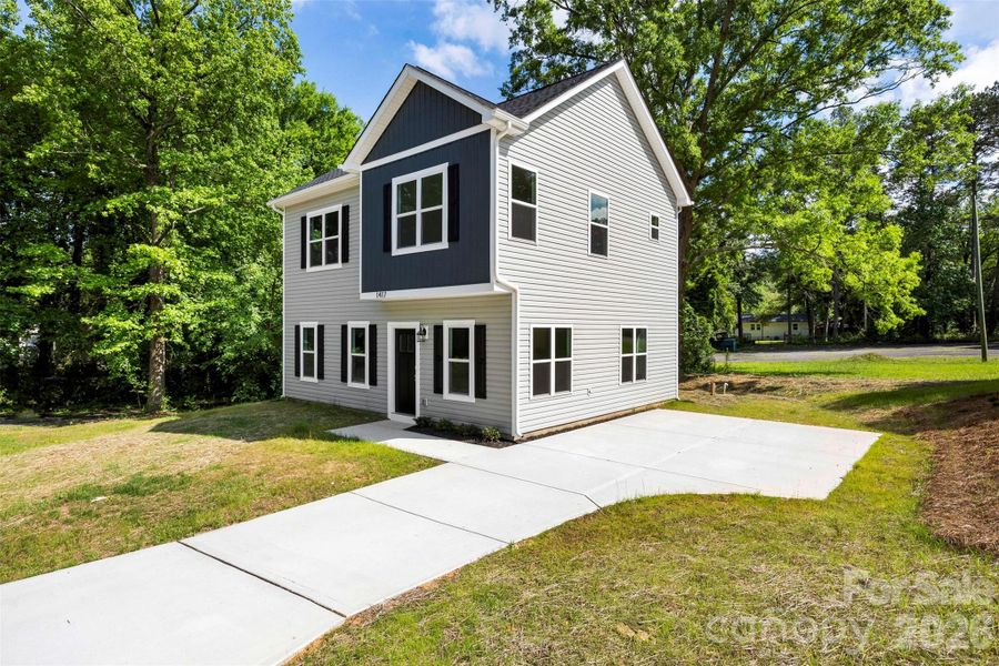 Front exterior of a new home in , Gastonia, NC, highlighting curb appeal (Image 22).