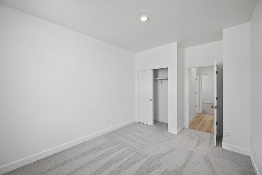Spacious, unfurnished interior of a new home in The Aurora Highlands, Aurora (Image 21).